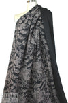 French printed 3-ply quilted-look knit - black deco flor 1 yard