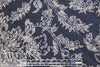French printed 3-ply quilted-look knit - navy deco flor 2.6 yds