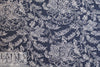 French printed 3-ply quilted-look knit - navy deco flor 2.6 yds