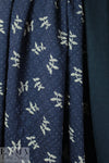 French printed 3-ply quilted-look knit - navy leaf/dot 2.25 yd