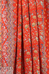 French red floral border viscose drapey woven 1.625 yd