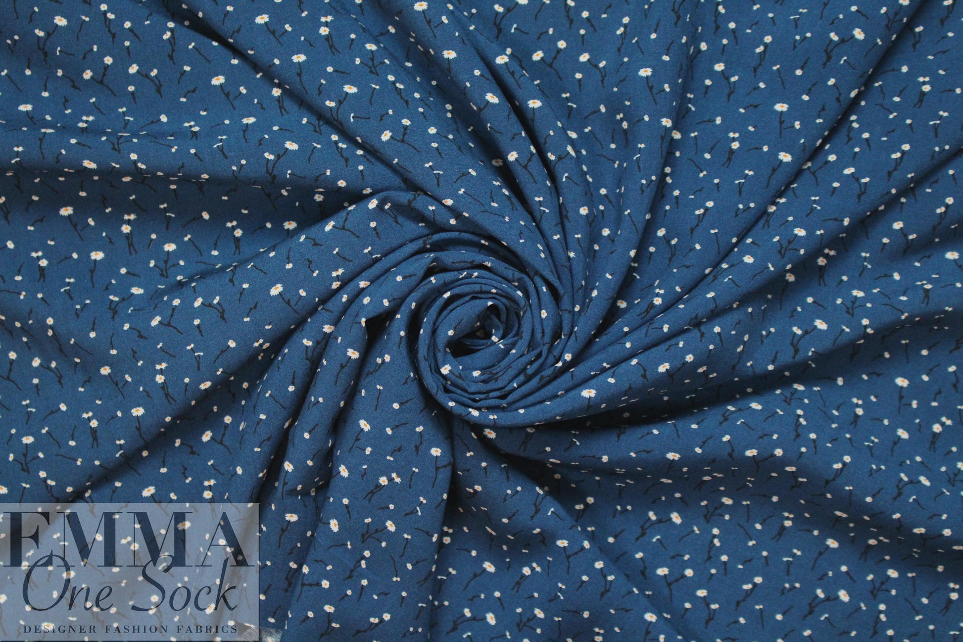 teeny blossoms on marine blue drapey rayon woven