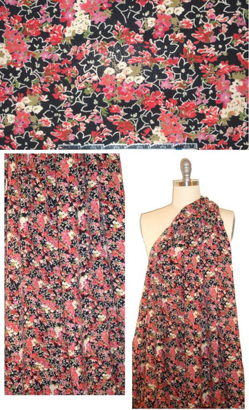 CA designer floral on black drapey rayon woven