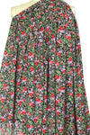 CA designer blossoms on black drapey rayon woven