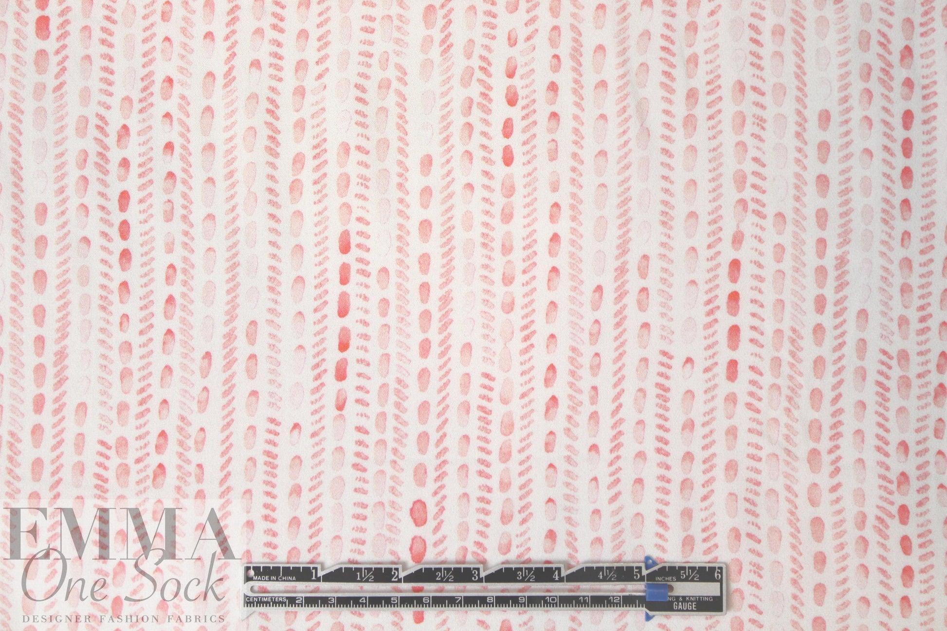 Italian coral/ivory graphic drapey viscose woven