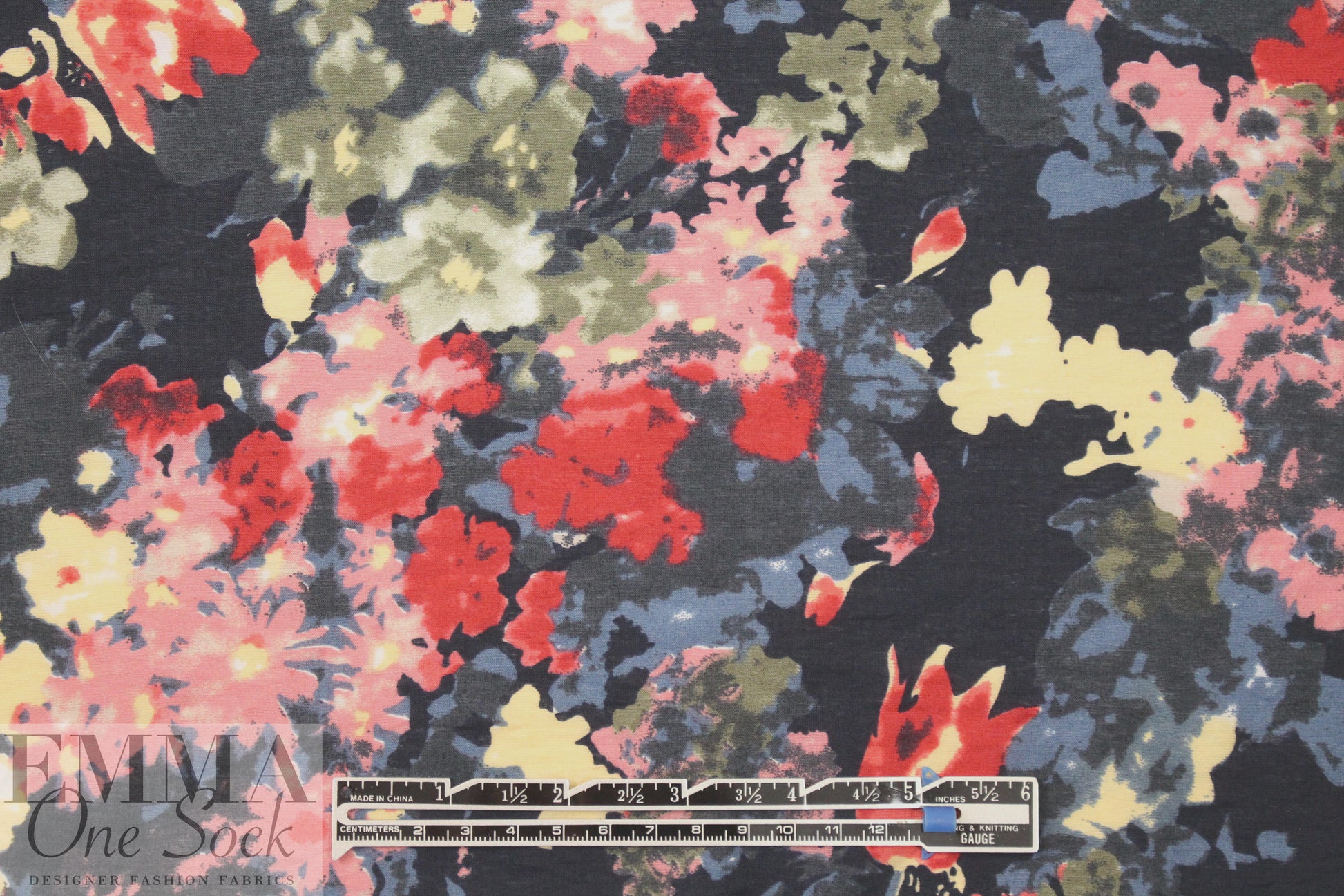 viscose/nylon blossoms on black drapey woven