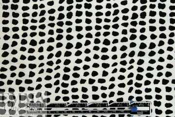 viscose/nylon black dots on white woven .75 yds