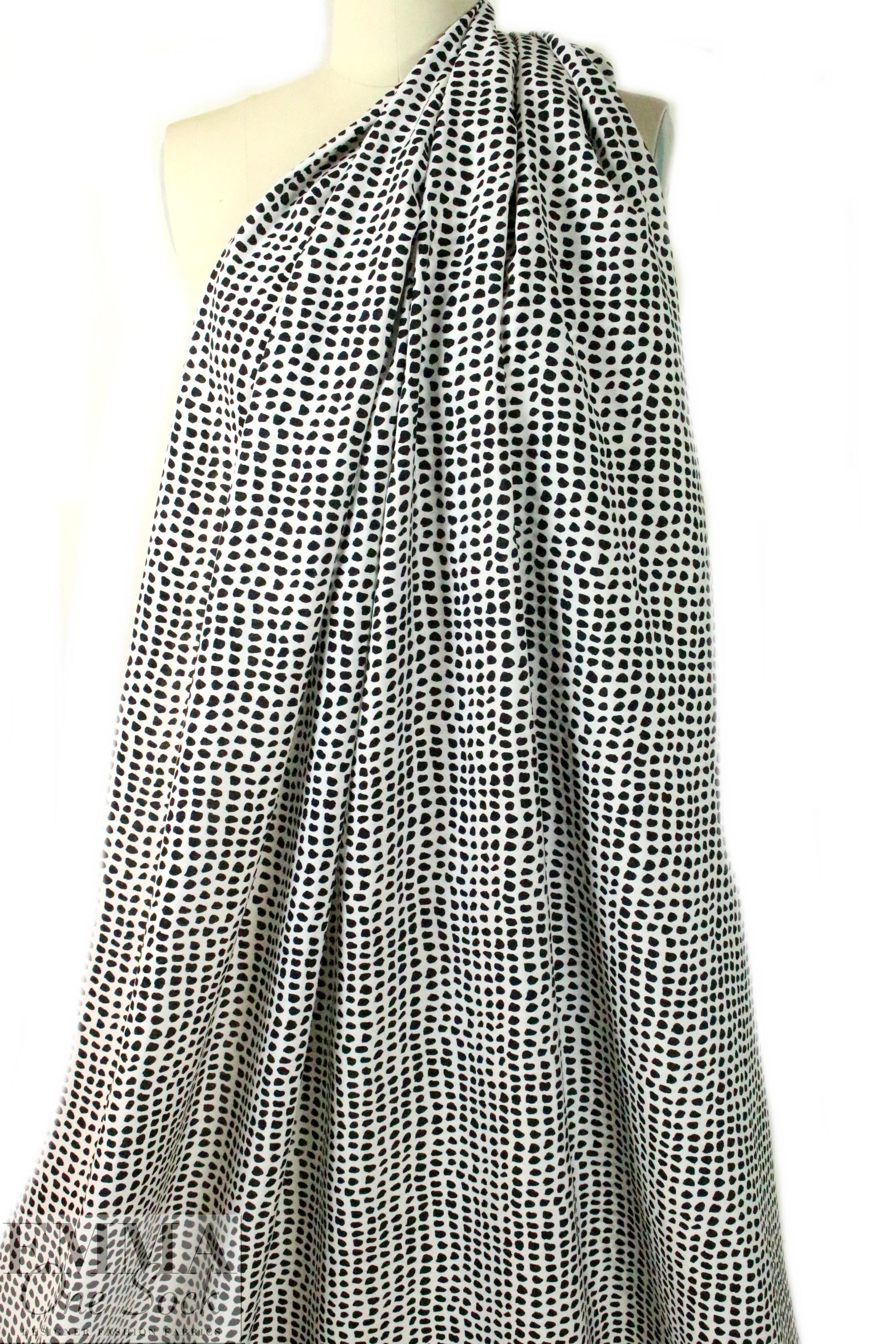 viscose/nylon black dots on white woven .75 yds