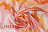 'layered leaves' rayon challis woven - pumpkin/light pink