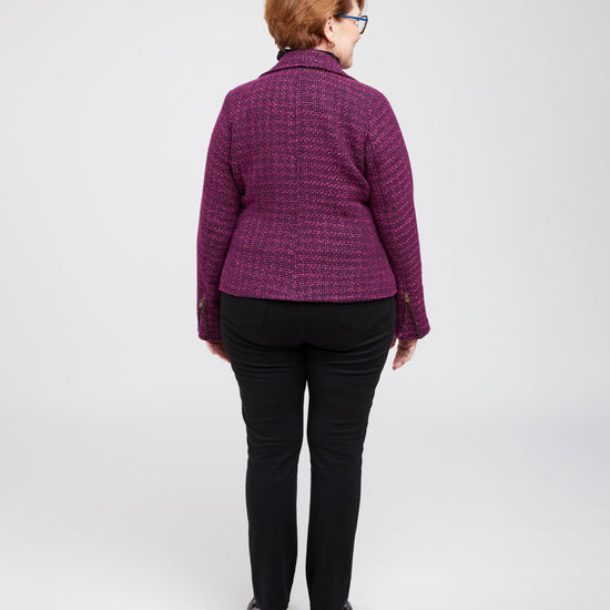 Person wearing a purple quilted jacket on a white background. This biker jacket is the Canton Moto Jacket sewing pattern from Cashmerette.