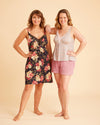 Two women wearing floral nightgown and pajama set on a beige background. This is the Fiske Sleepwear Set sewing pattern from Cashmerette.