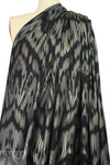 'Rio' black/gold metallic textured over-printed knit  1.625 yds