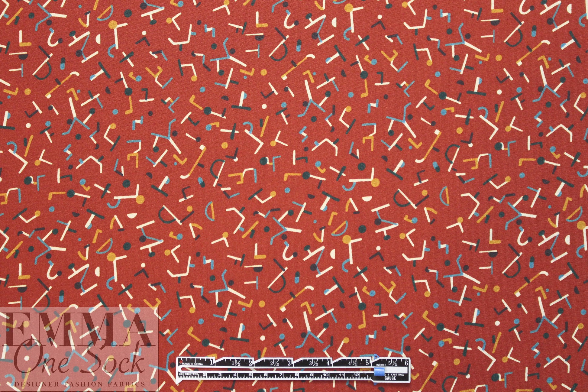 paprika 'confetti shapes' poly crepe woven 1.625 yd