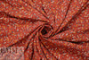 paprika 'confetti shapes' poly crepe woven 1.125 yds