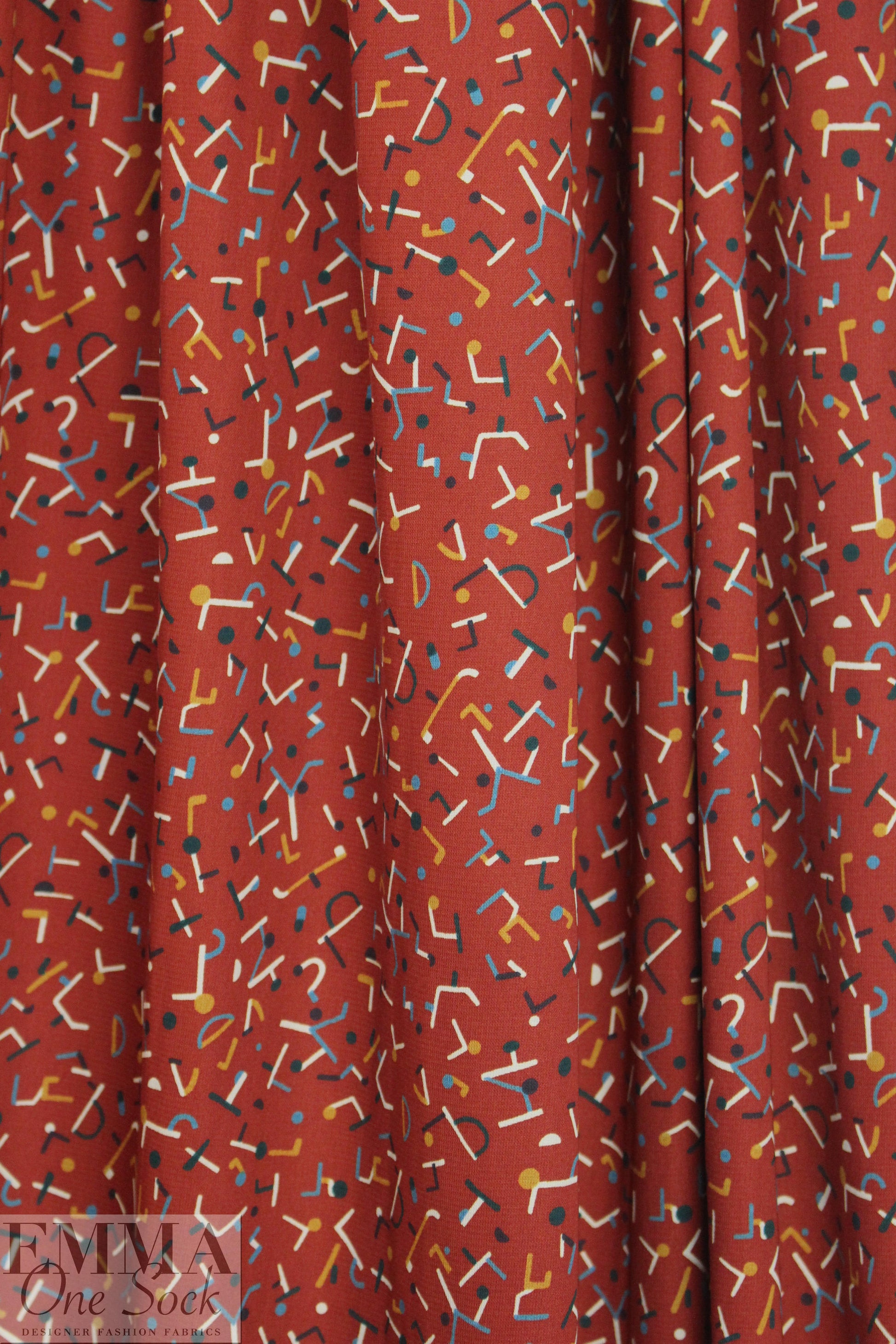 paprika 'confetti shapes' poly crepe woven 1.5 yds