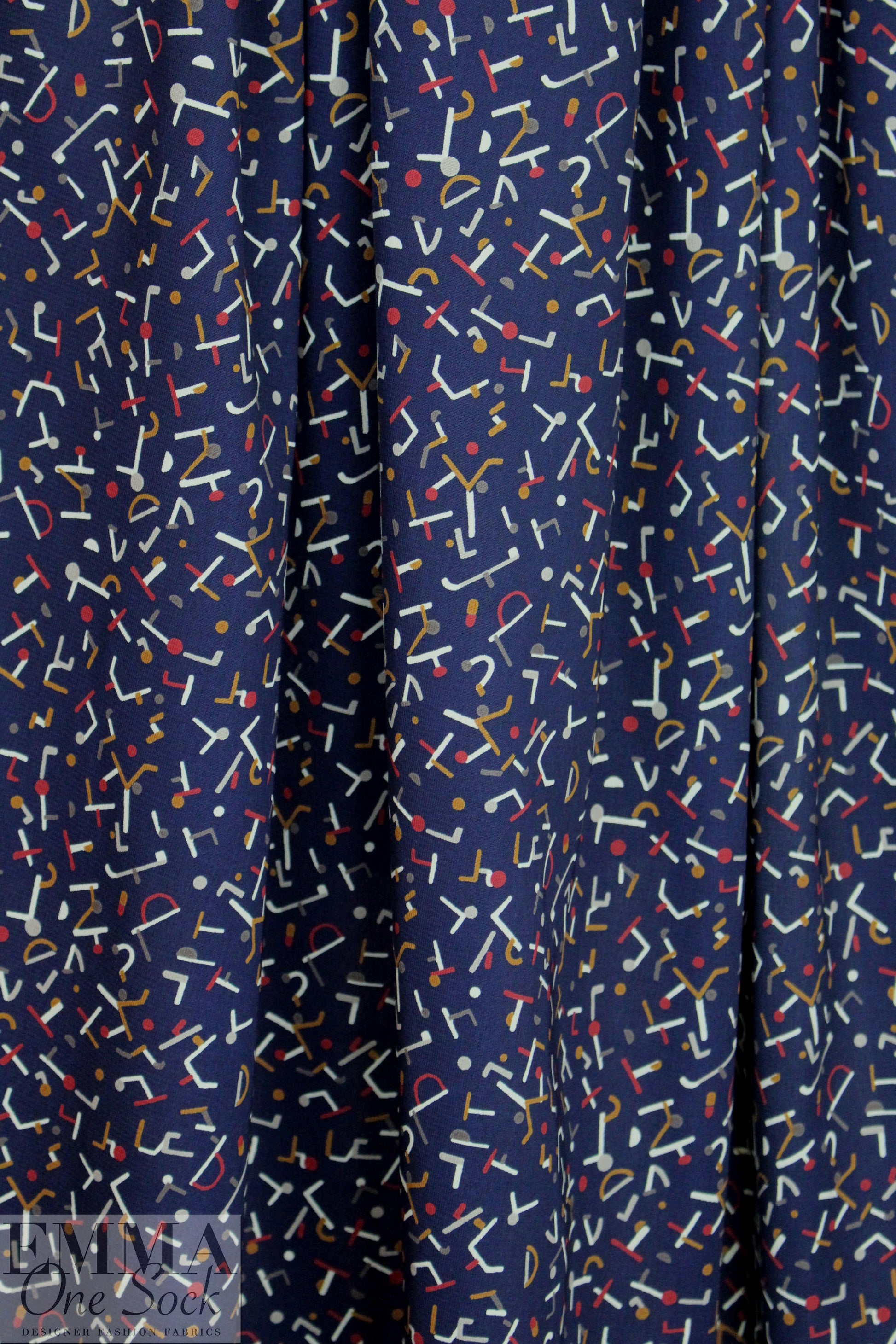navy 'confetti shapes' poly crepe woven 1.625 yd