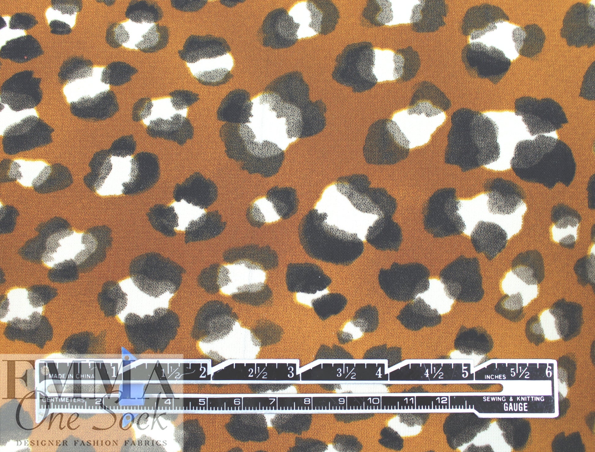 golden brown leopard dot poly crepe woven 1.75 yd