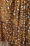 golden brown leopard dot poly crepe woven 1.75 yd