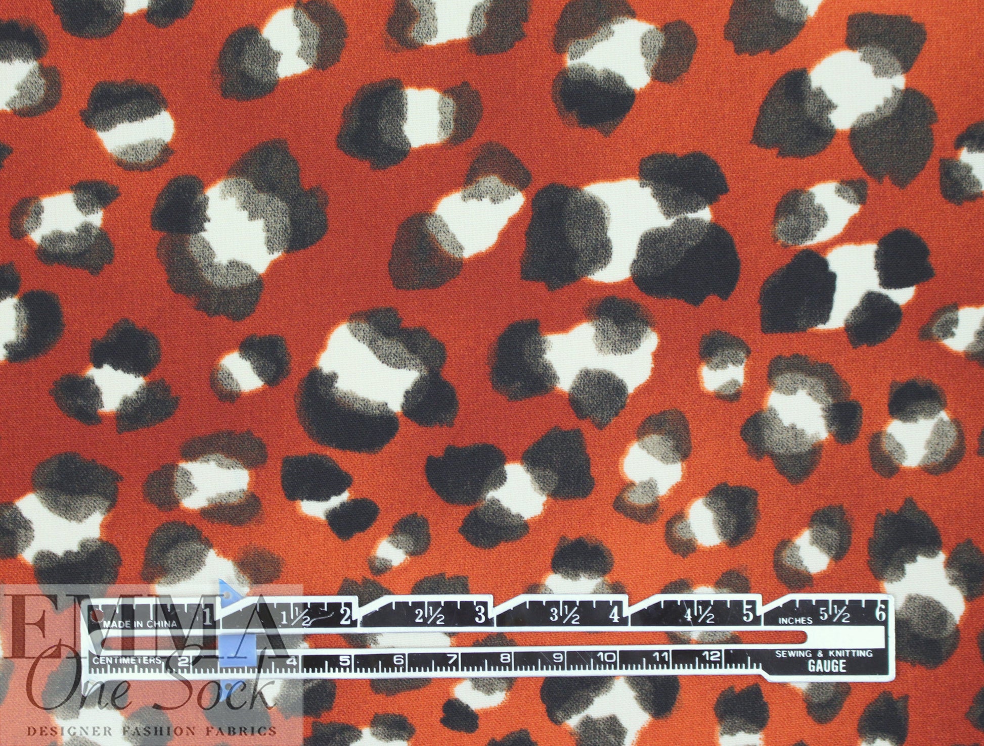 paprika leopard dot poly crepe woven 1.625 yd