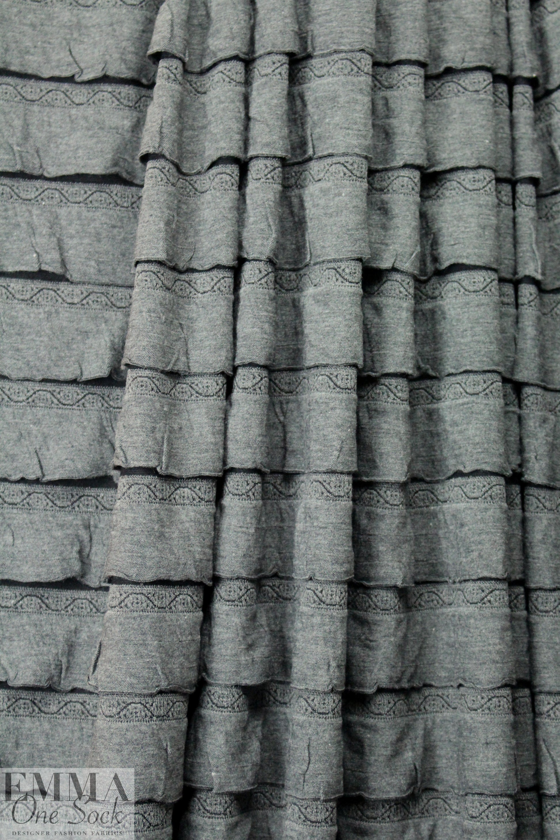 CA designer 2-ply novelty ruffle knit - gray/black 1.125 yds