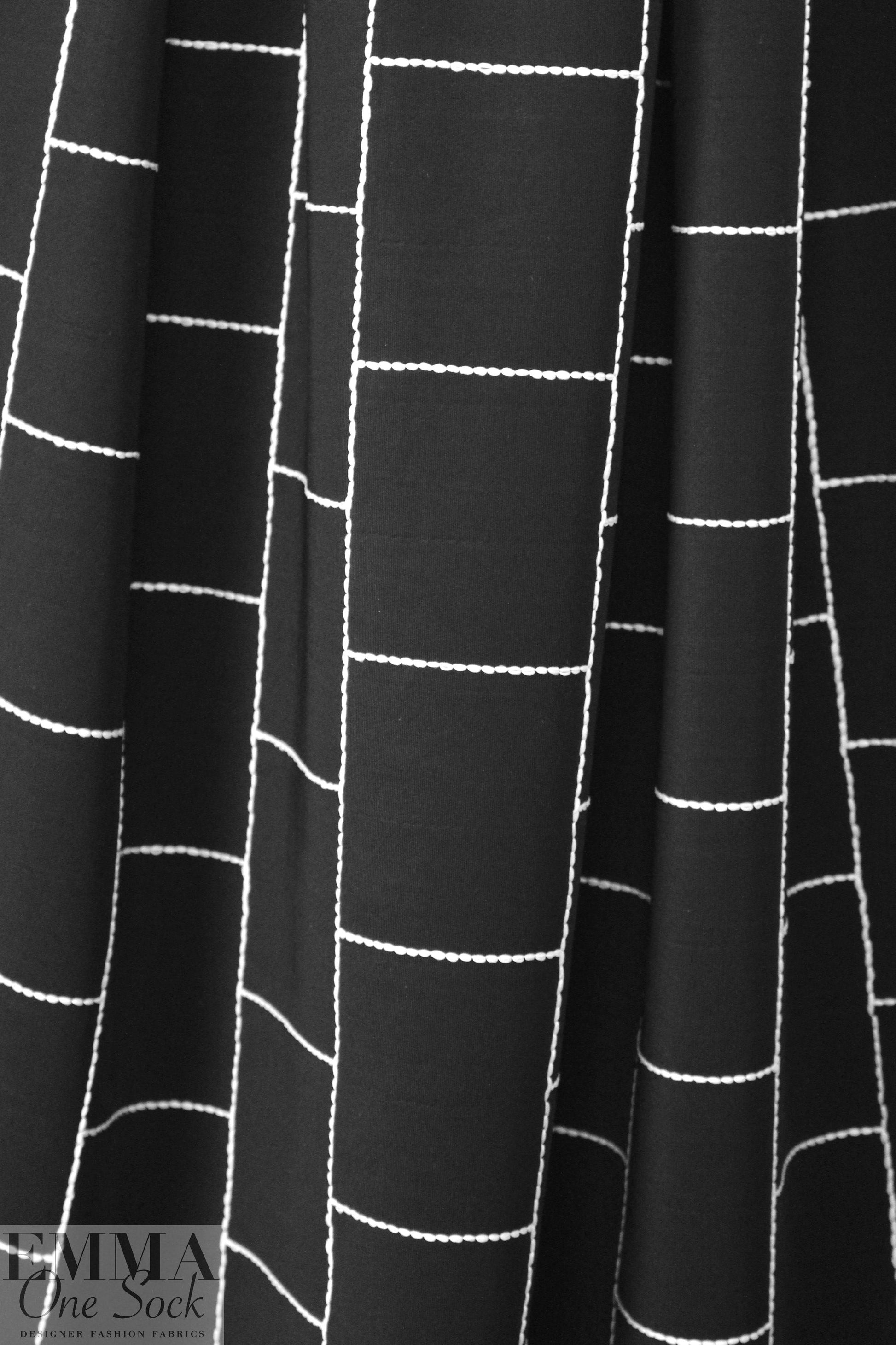 famous designer black/white embroidered scuba knit