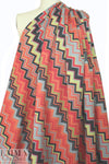 NY designer 'upstairs, downstairs' graphic scuba knit