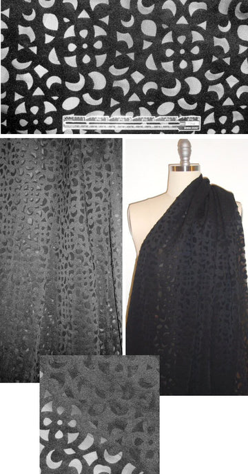 NY designer laser cut black neoprene/scuba 1.125 yds