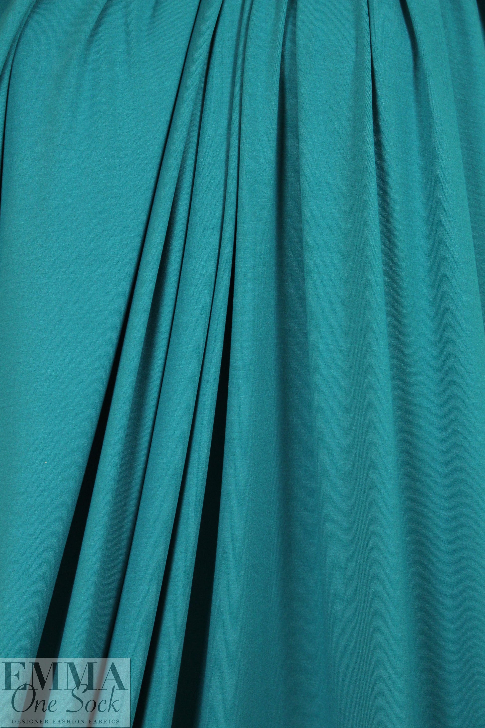 bright teal lightweight rayon jersey 4-way .75 yds