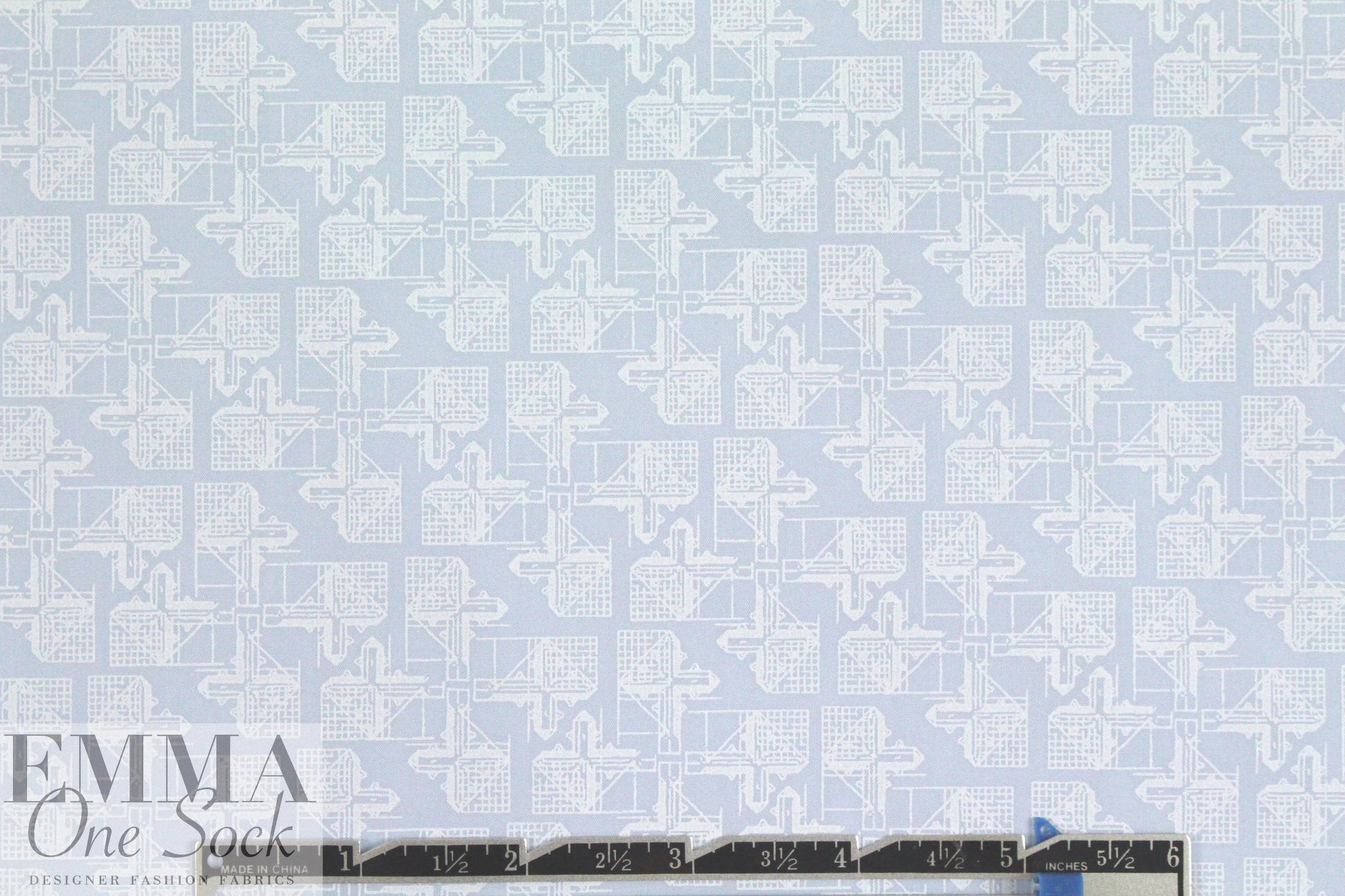 French techno graphic on powder blue cotton shirting