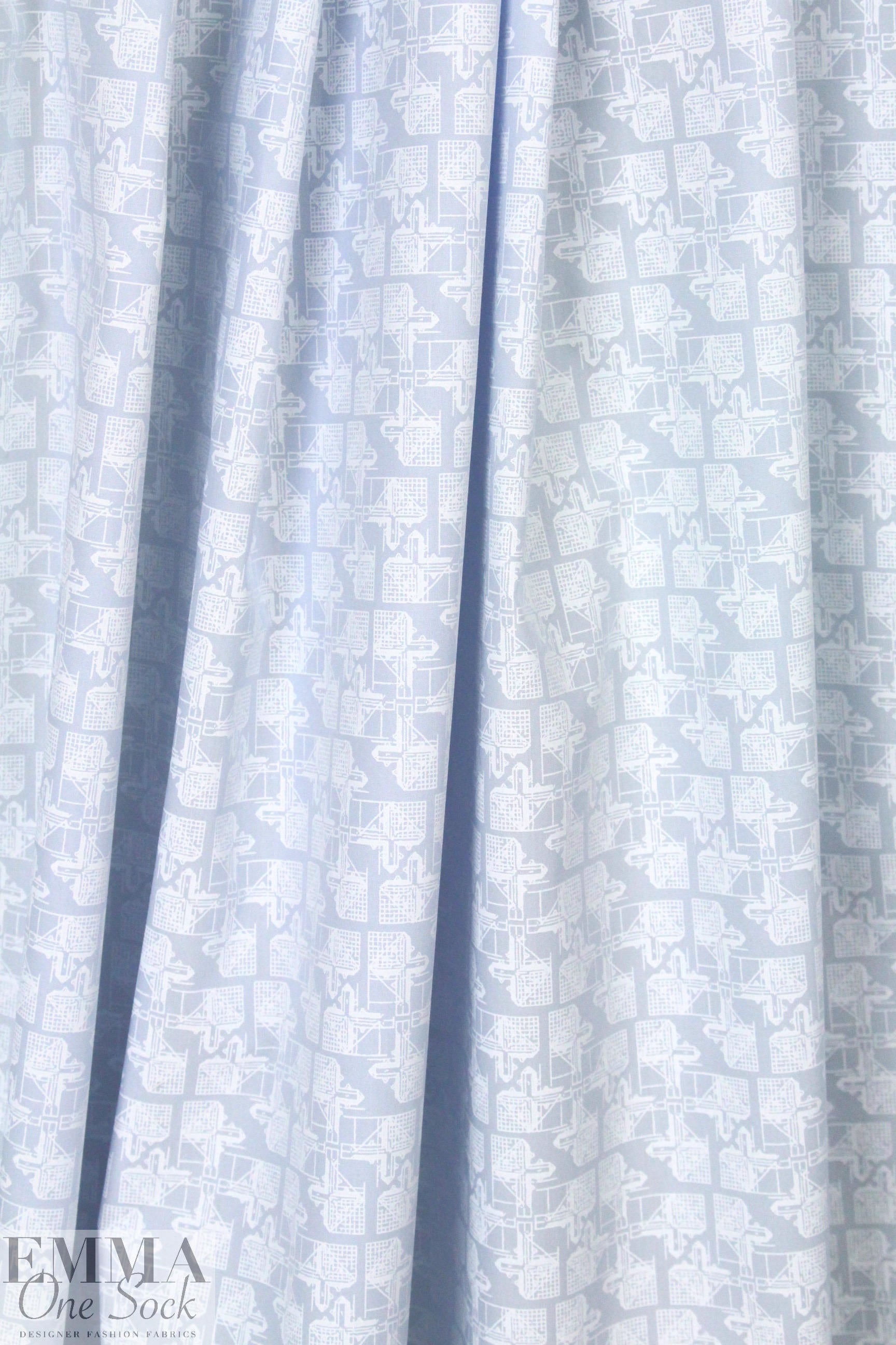 French techno graphic on powder blue cotton shirting .75 yds