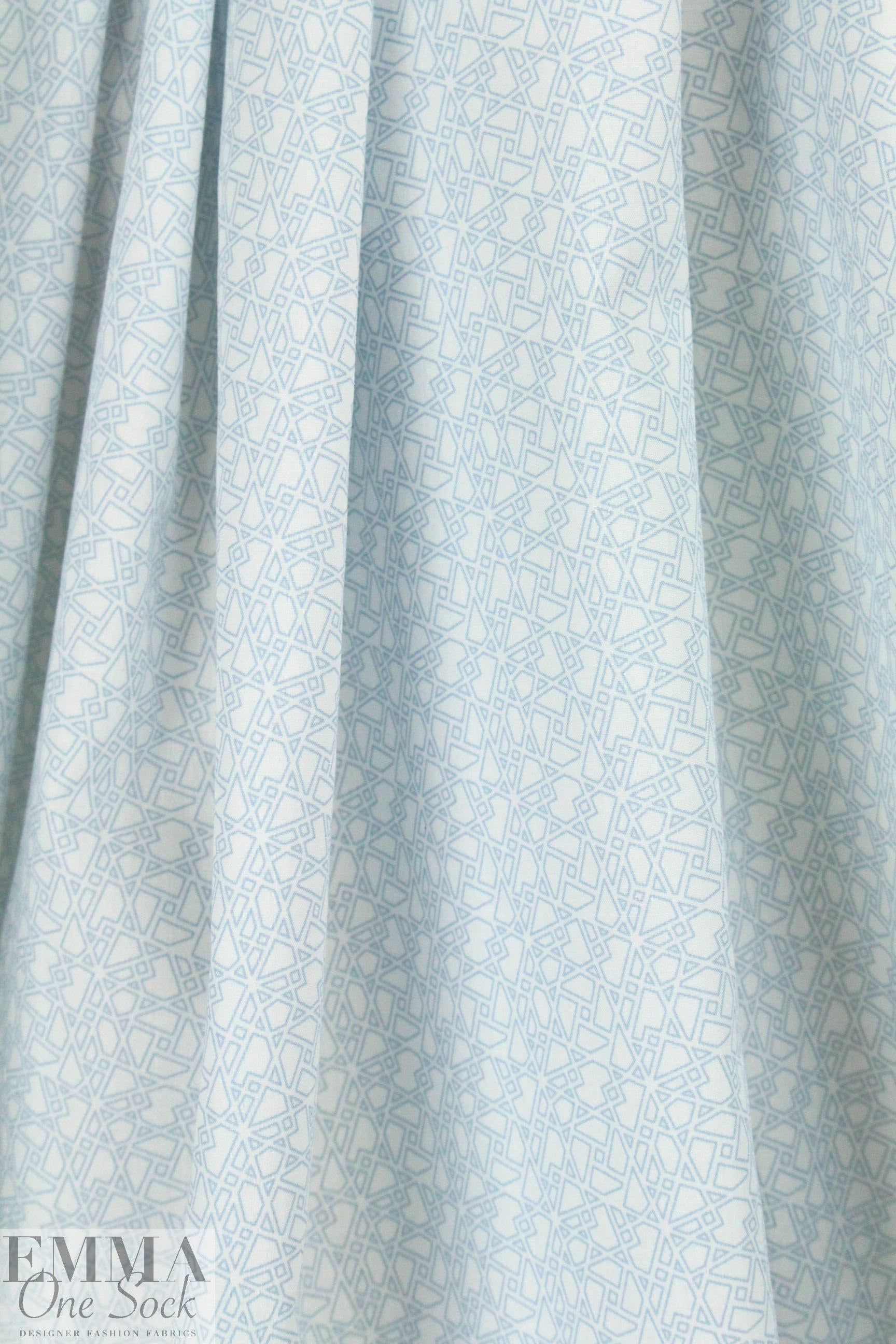 French pale blue motif on white cotton shirting