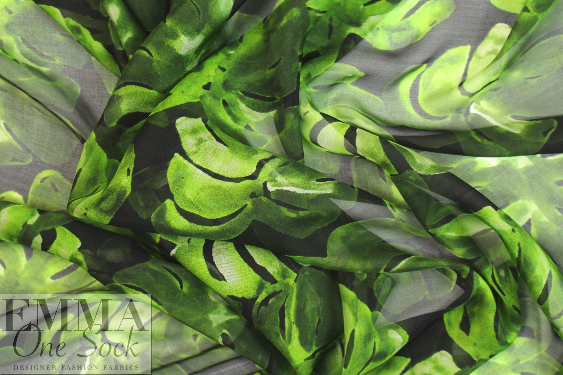 Caroline C0nstas monstera leaves on black silk chiffon 3 yd