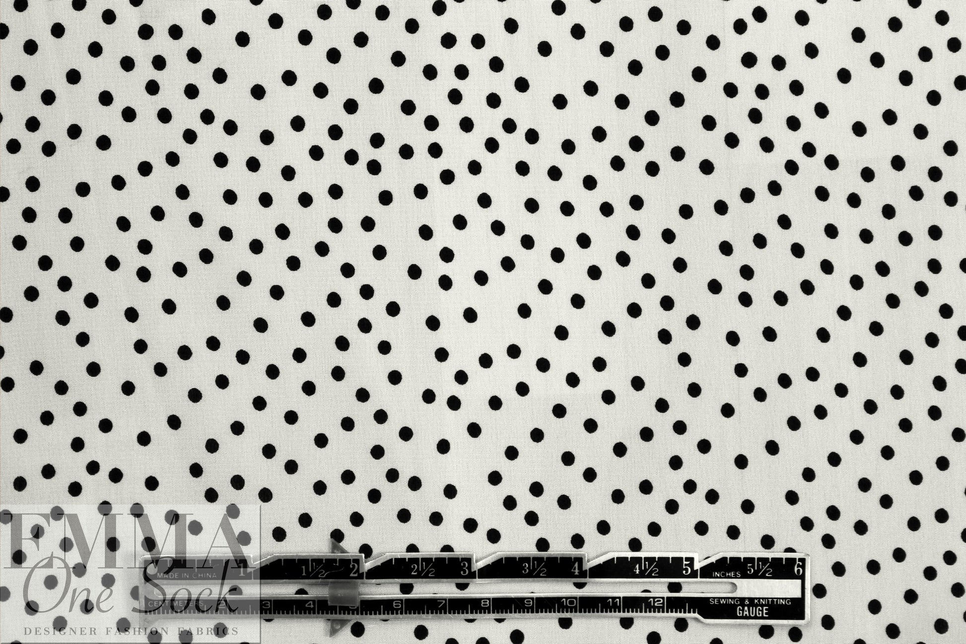 famous designer silk crepe de chine - black dot on cream .625 yds