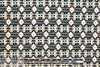 famous designer graphic design CDC - black/turq 1.875 yd