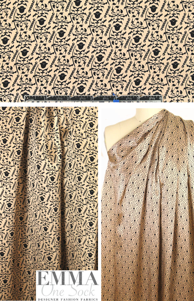 NY designer peach/black emblem graphic silk charmeuse 1.875 yd