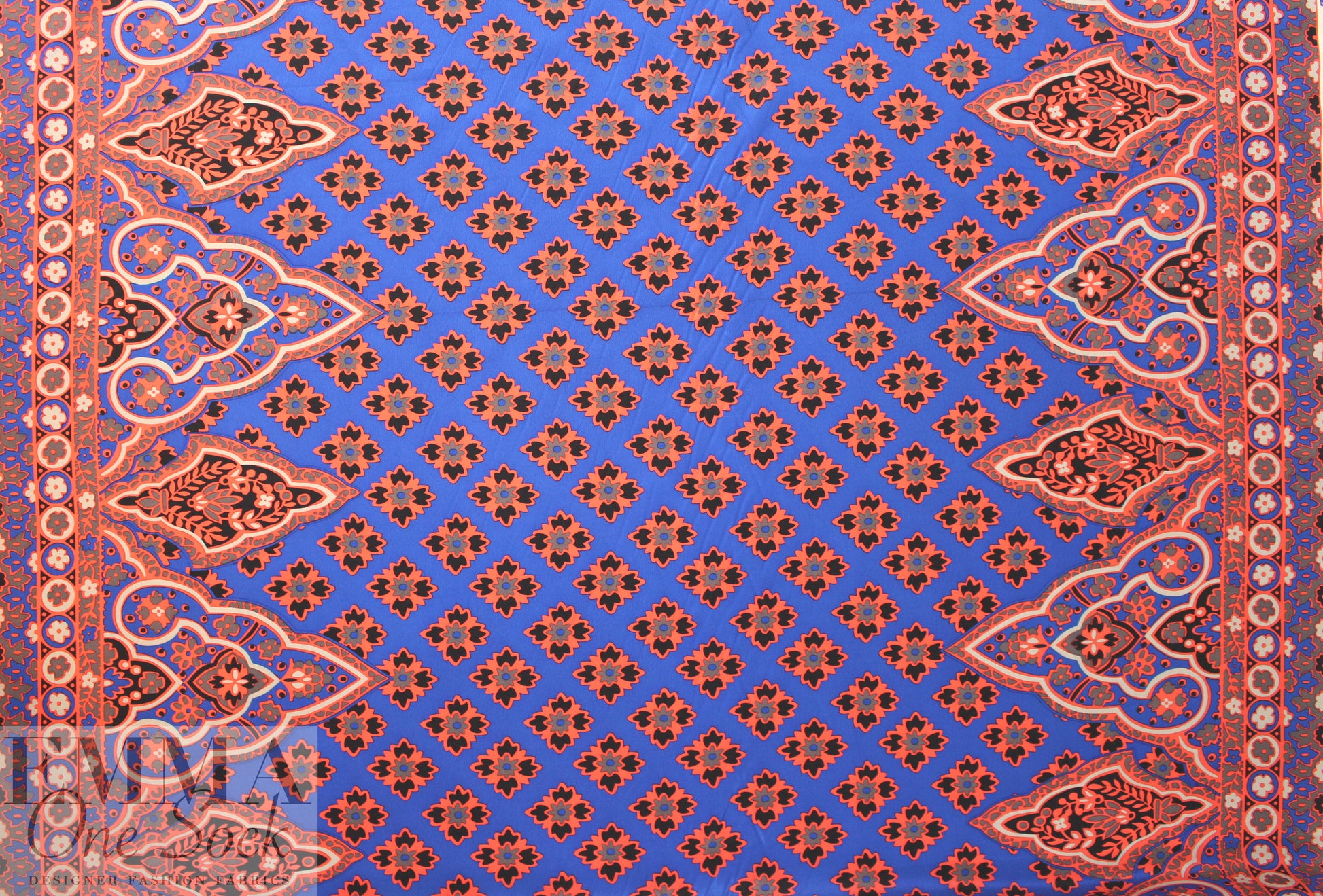 famous designer border design CDC - coral/cobalt 1.875 yd