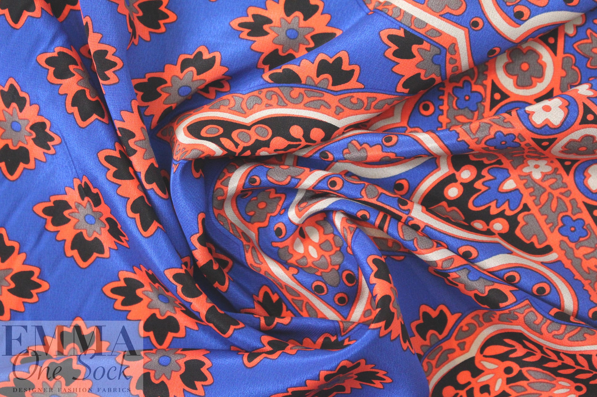 famous designer border design CDC - coral/cobalt 1.875 yd