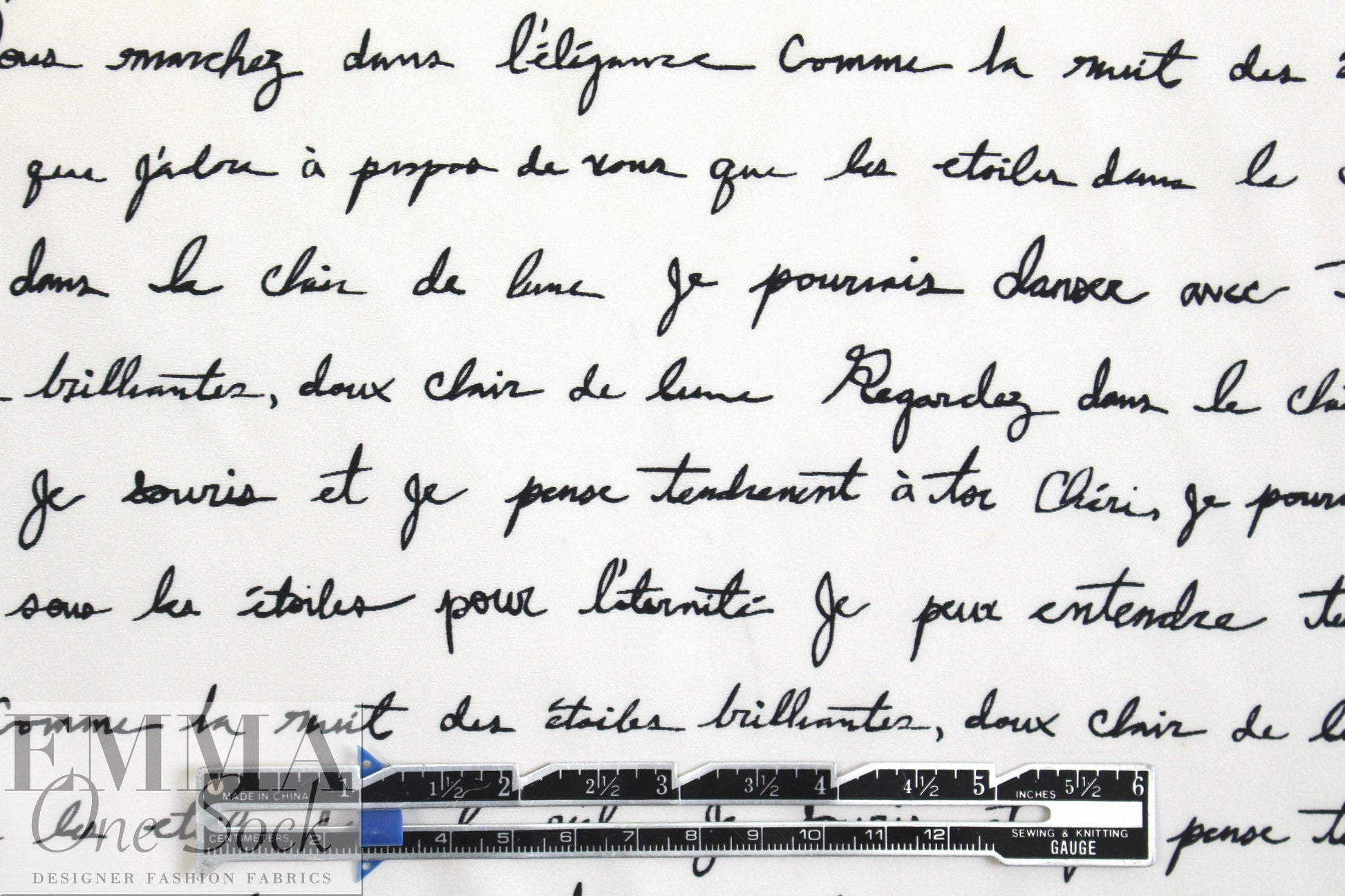 Italian black on cream french script silk charmeuse .95 yds