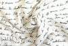 Italian black on cream french script silk charmeuse .95 yds