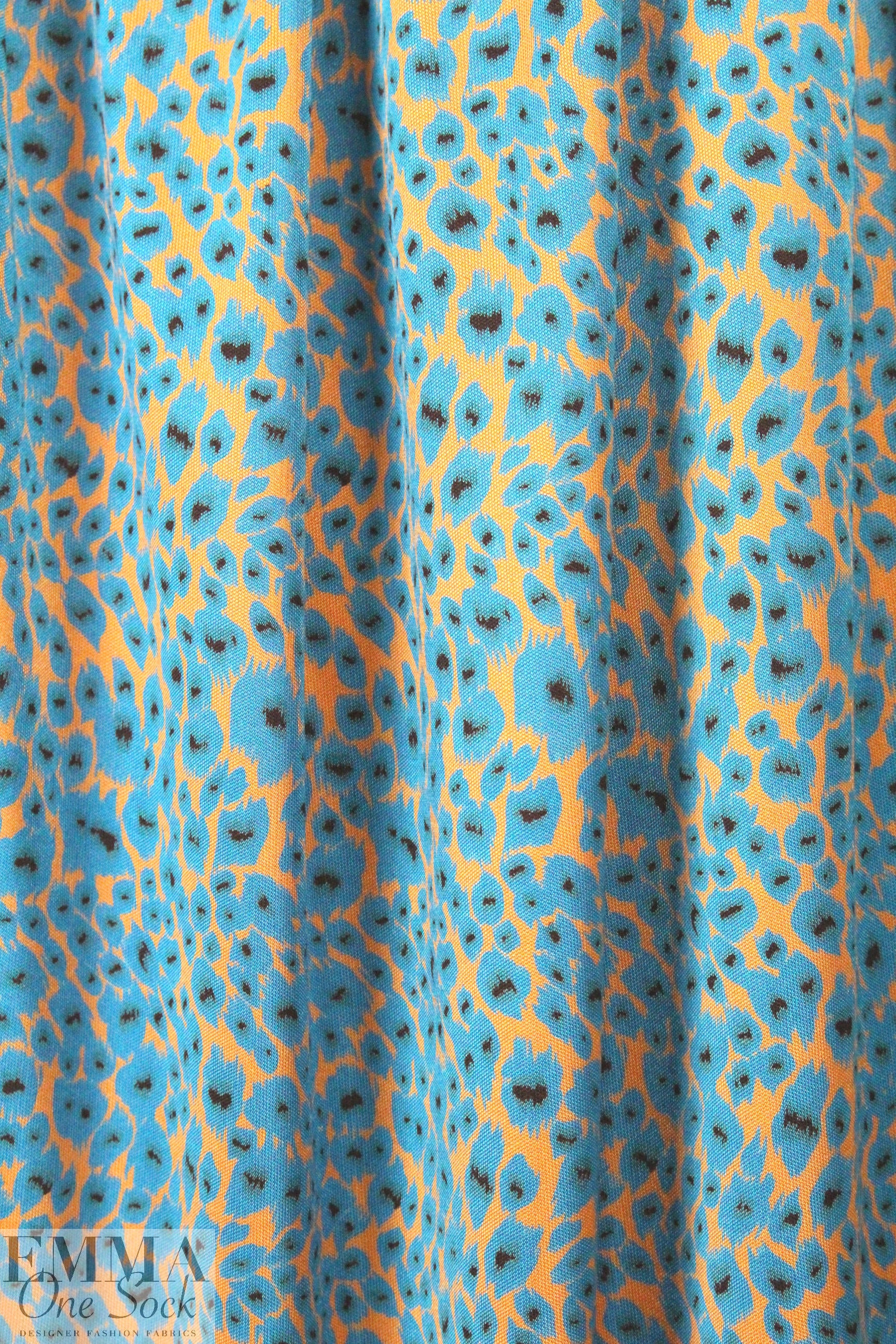 NY designer turquoise/marigold silk jersey