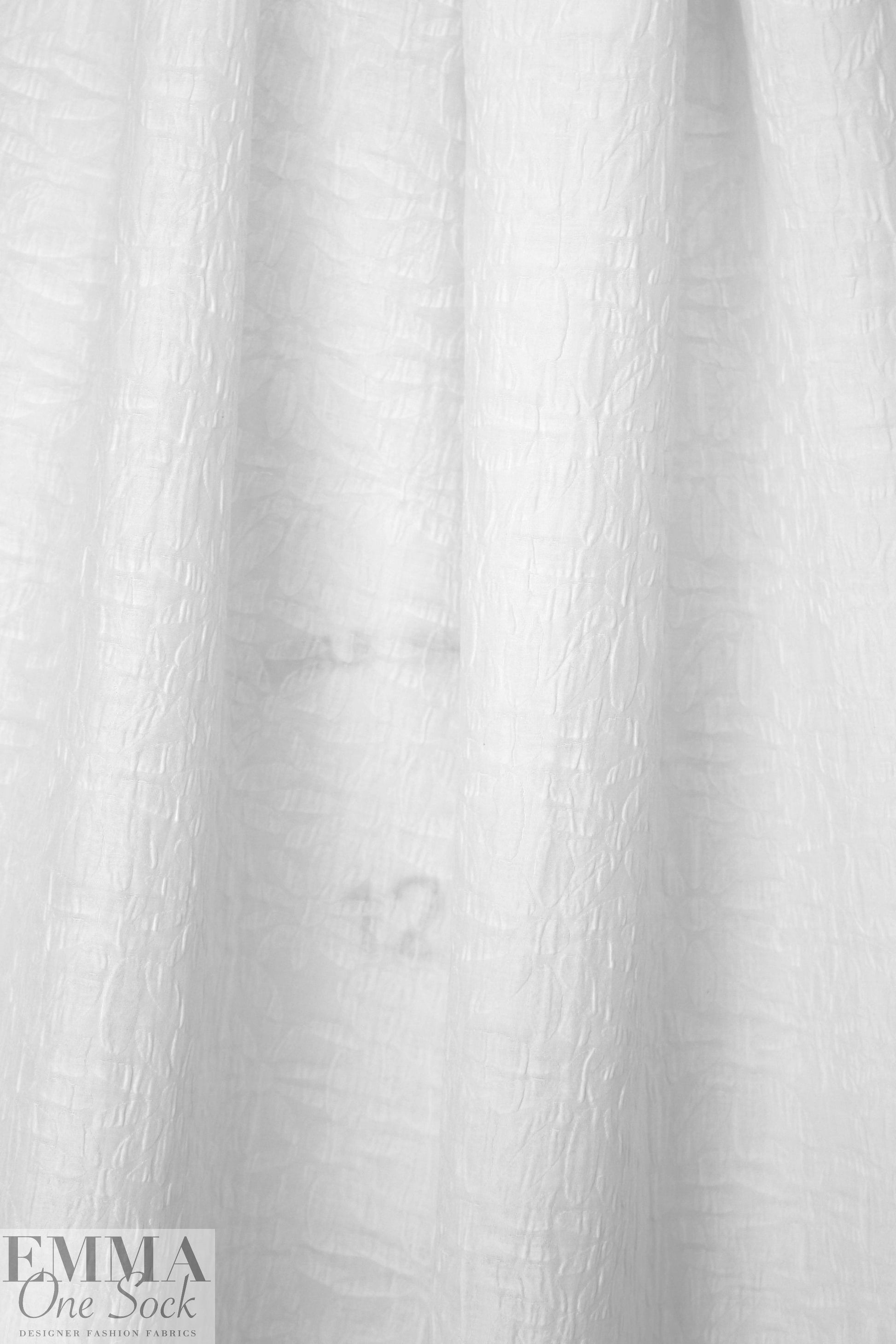 NY designer textured floral matelasse' - white 1.45 yds