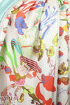 Italian surreal flowers border print silk twill