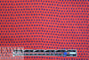 famous designer navy diamonds on red silk twill