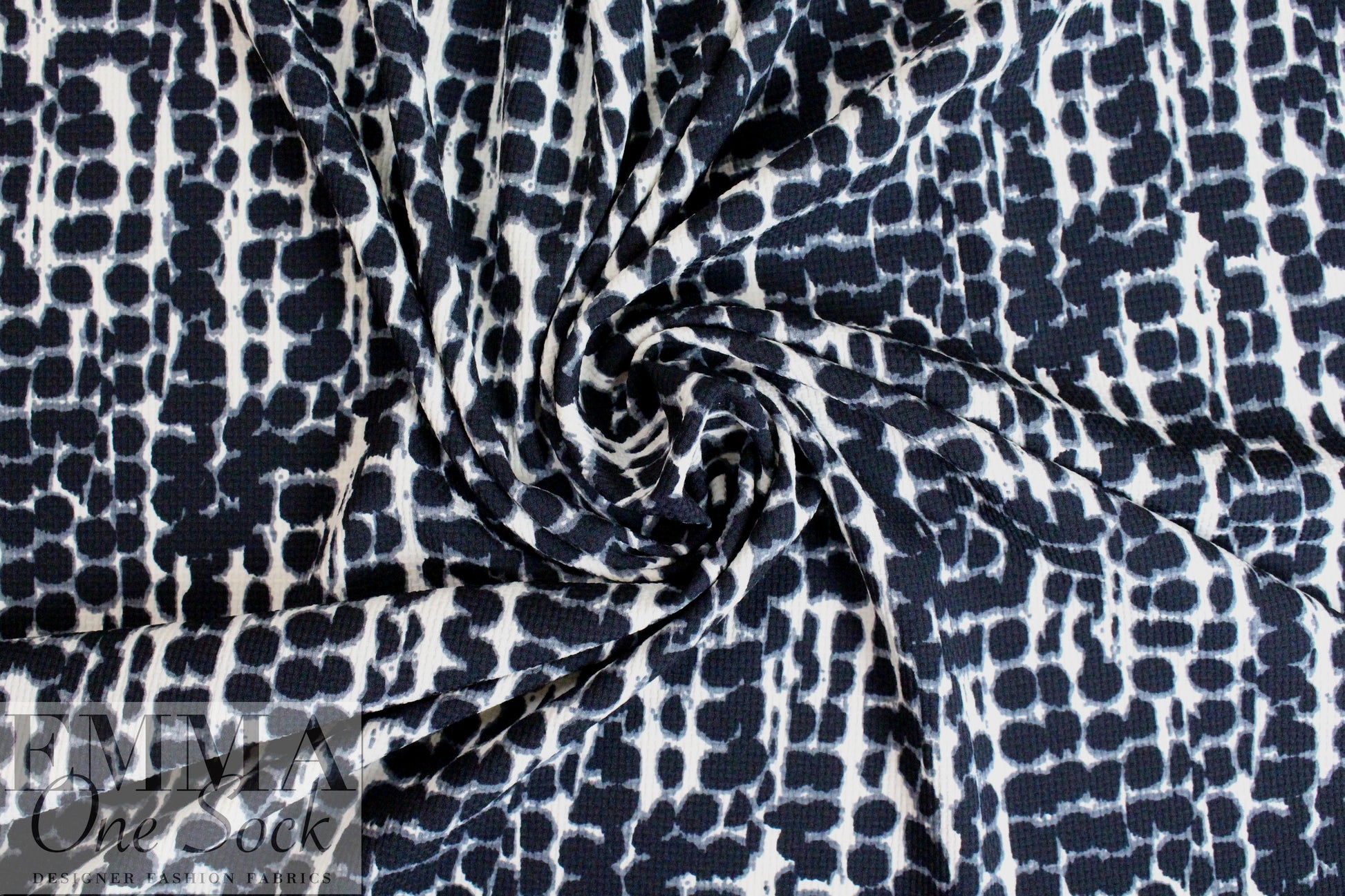 Italian waffle-textured stretch woven - cellular graphic