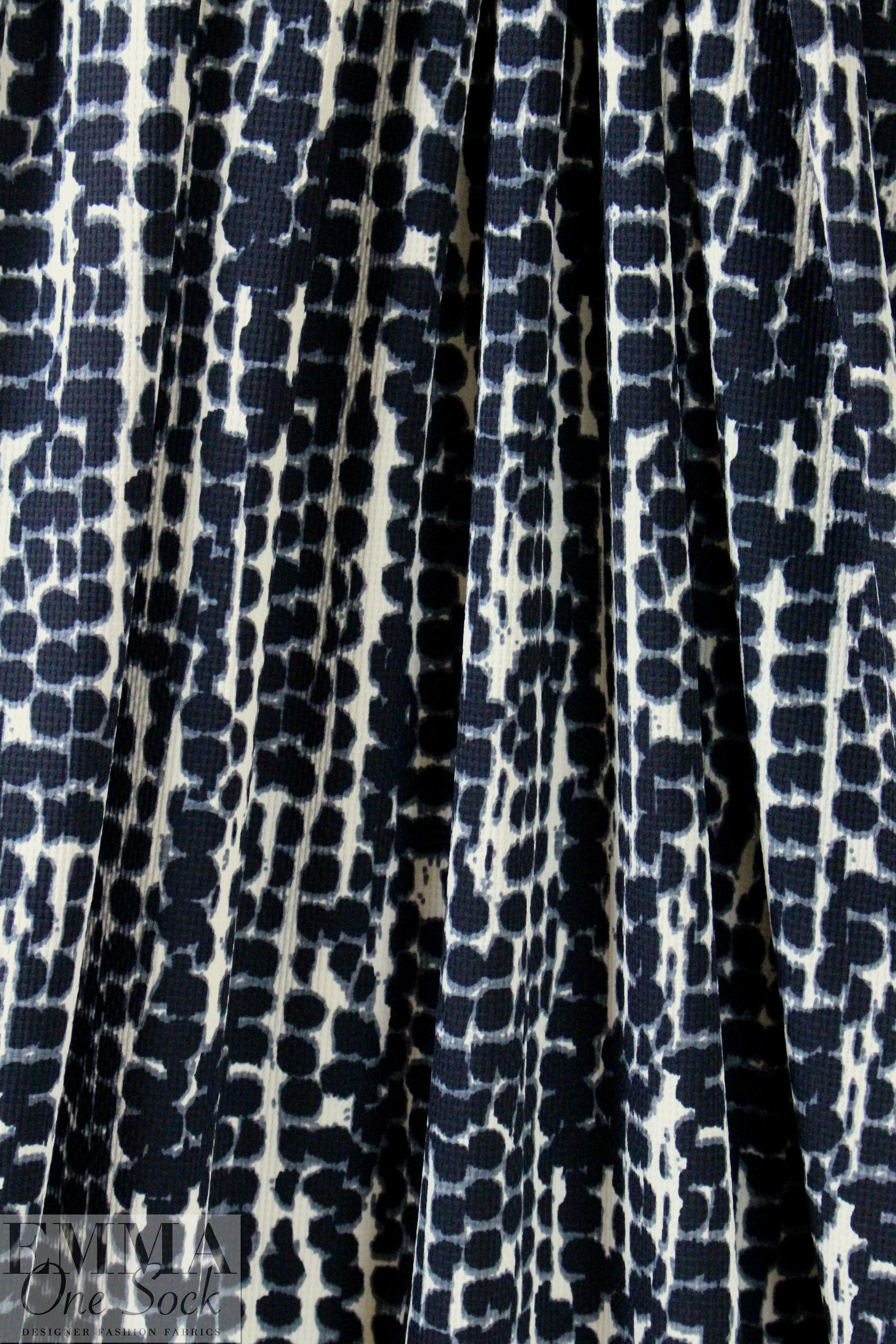 Italian waffle-textured stretch woven - cellular graphic