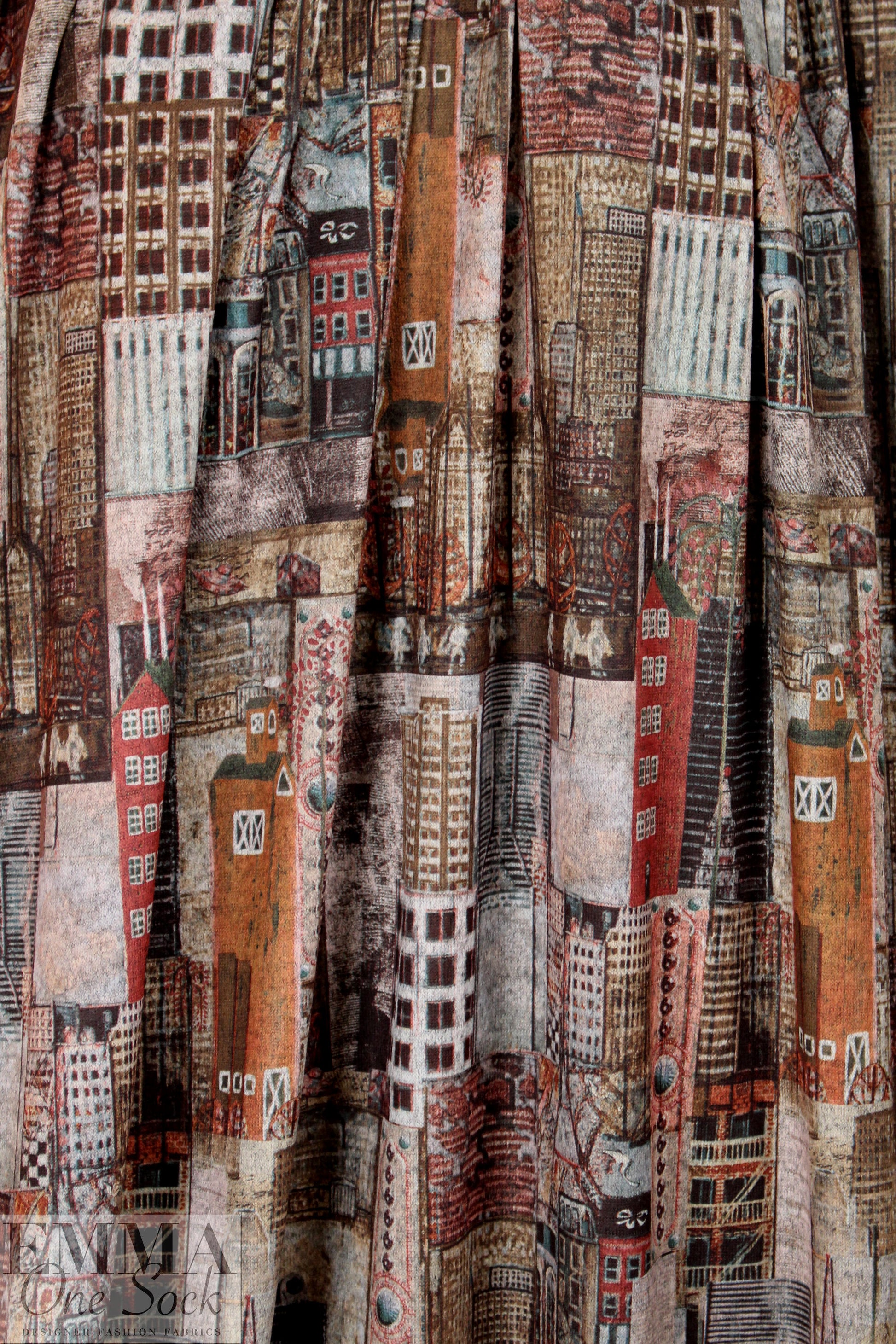 'urban montage' design sweater knit - mocha/brick .625 yds