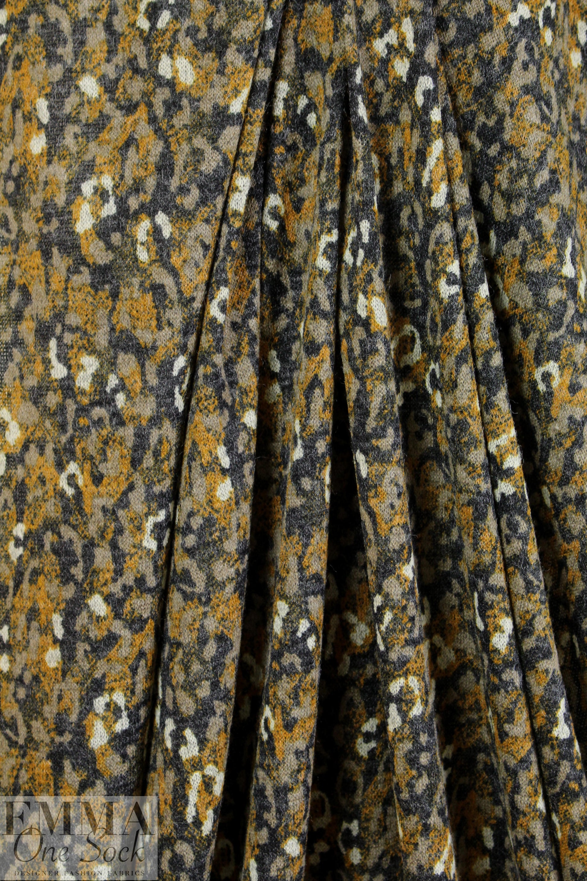 heathered, printed sweater knit - spotted dijon .625 yds