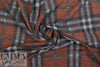 heathered, printed plaid sweater knit - rust/nutmeg