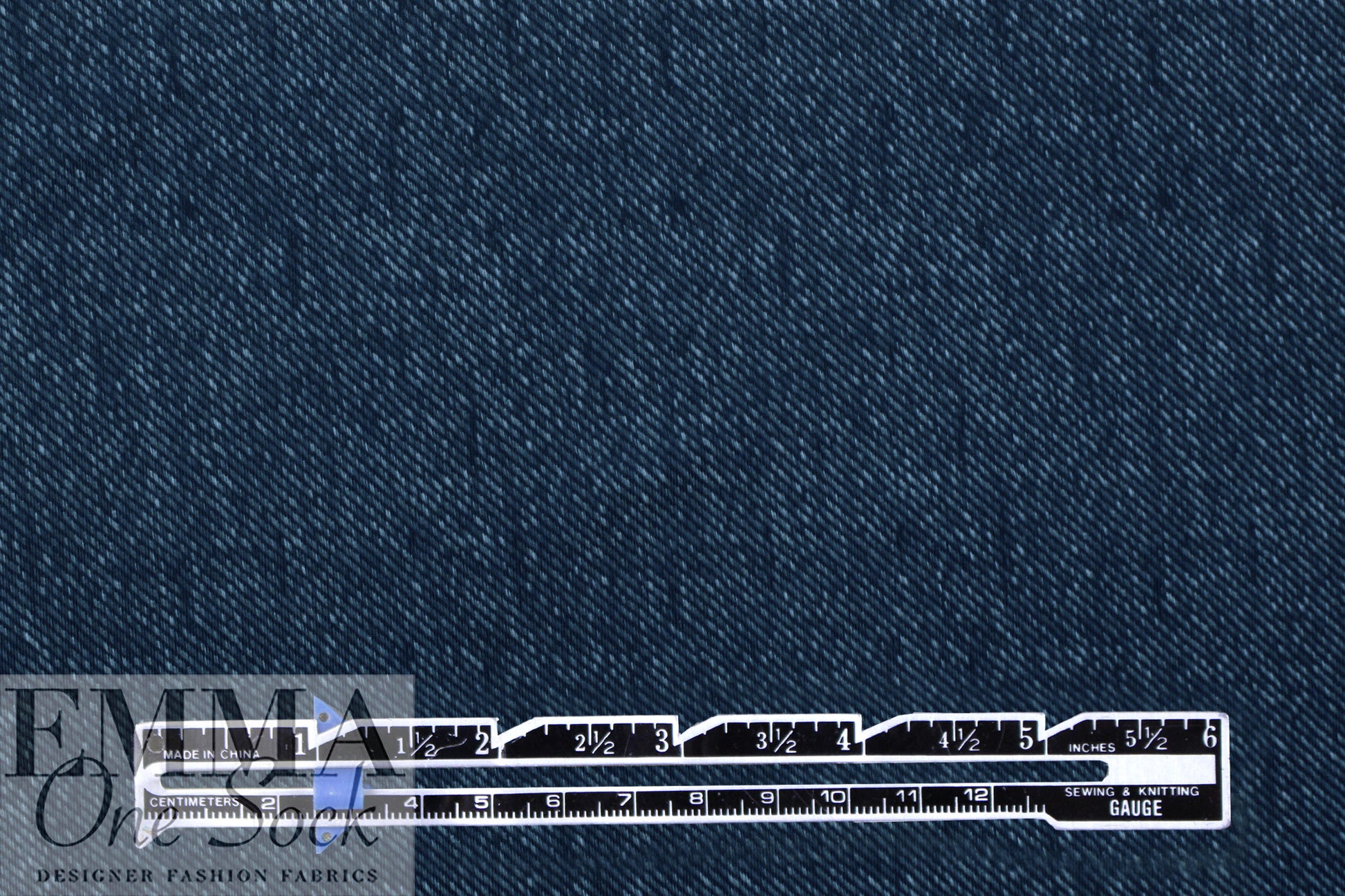 Text0llini denim look printed nylon knit .875 yds