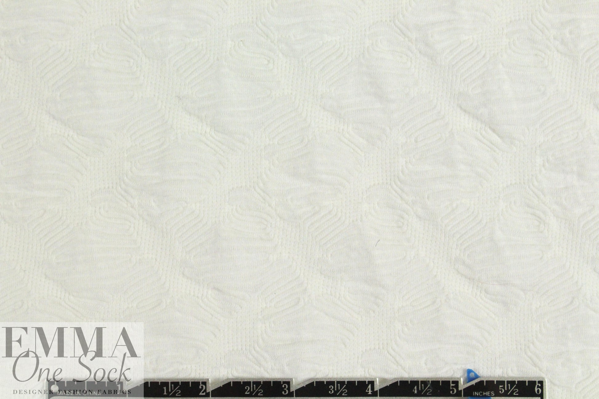 famous designer textured white novelty knit